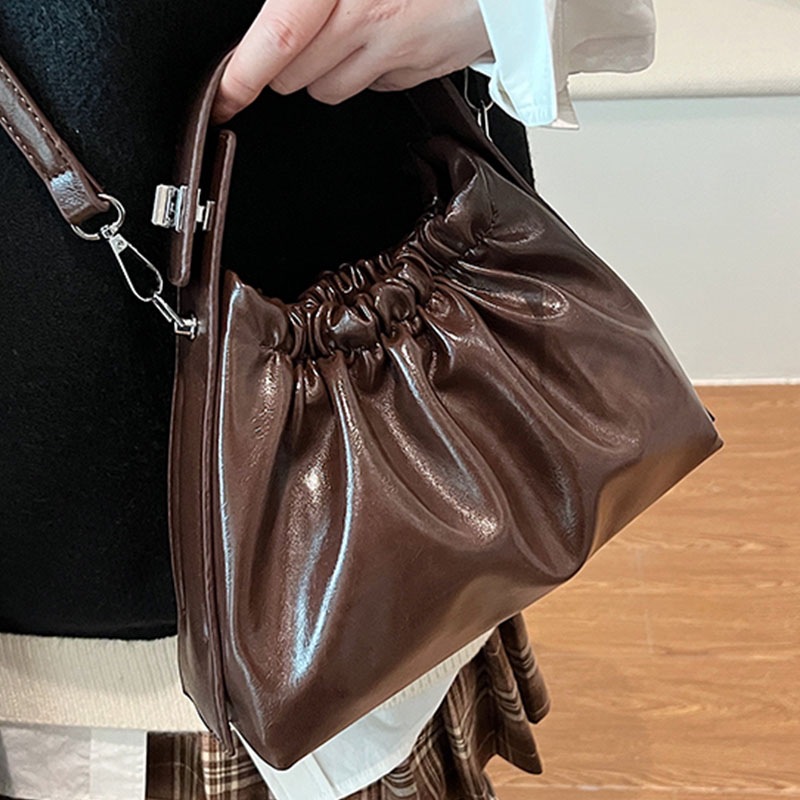 حقيبة نسائية بورجوندي مزينة بك - مراجعة Top Handle Patent Bag وسعره