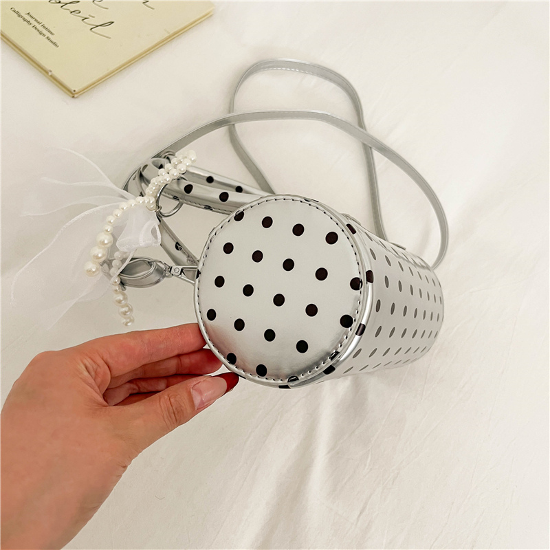 حقيبة يد كورية صغيرة منقطة بتص - مراجعة Top Handle Patent Bag وسعره
