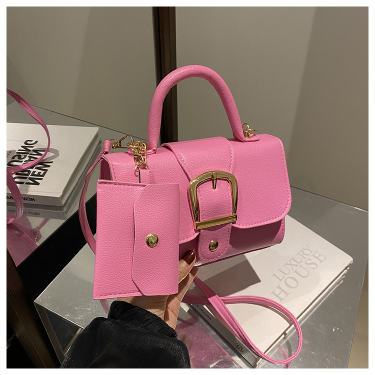 حقيبة يد نسائية صغيرة من الجلد - مراجعة Top Handle Patent Bag وسعره